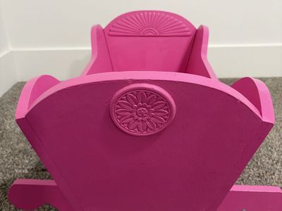Cute pink wooden doll cradle