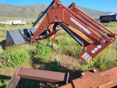 self leveling loader woods dual