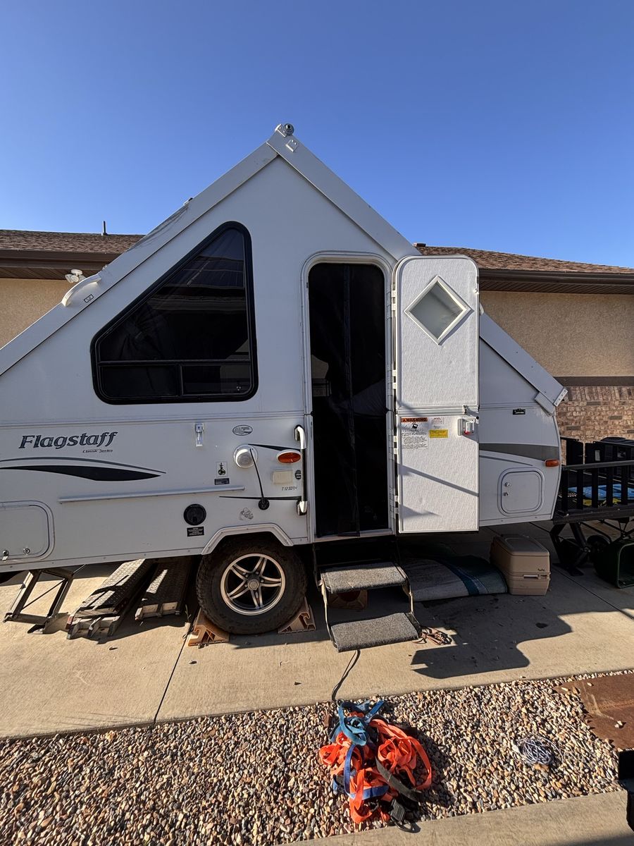 2013 Forest river T12SDTH hard side with deck