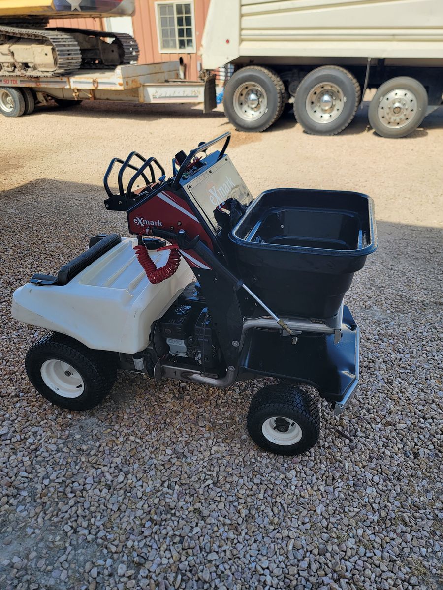 Exmark fertilizer and spreader