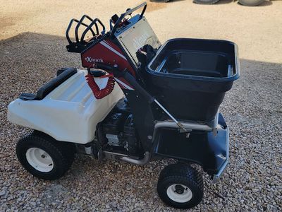 Exmark fertilizer and spreader
