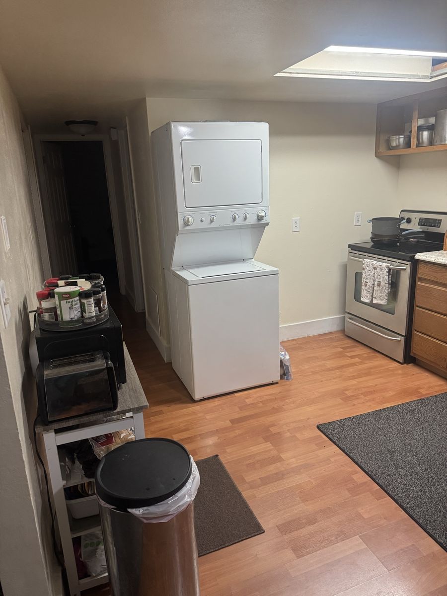 Stacked clothes washer and dryer