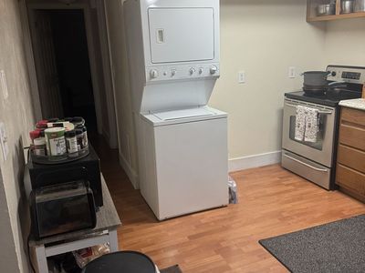 Stacked clothes washer and dryer