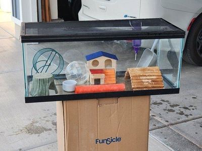 Hamster or reptile cage with accessories