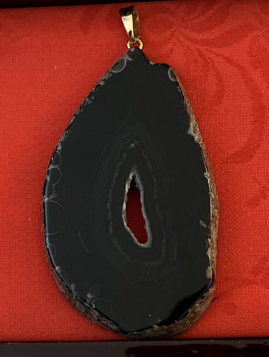 Black cut stone pendant