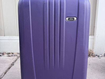 Skyway Luggage Co. Purple Hardside Carry-On Suitcase with Spinner Wheels