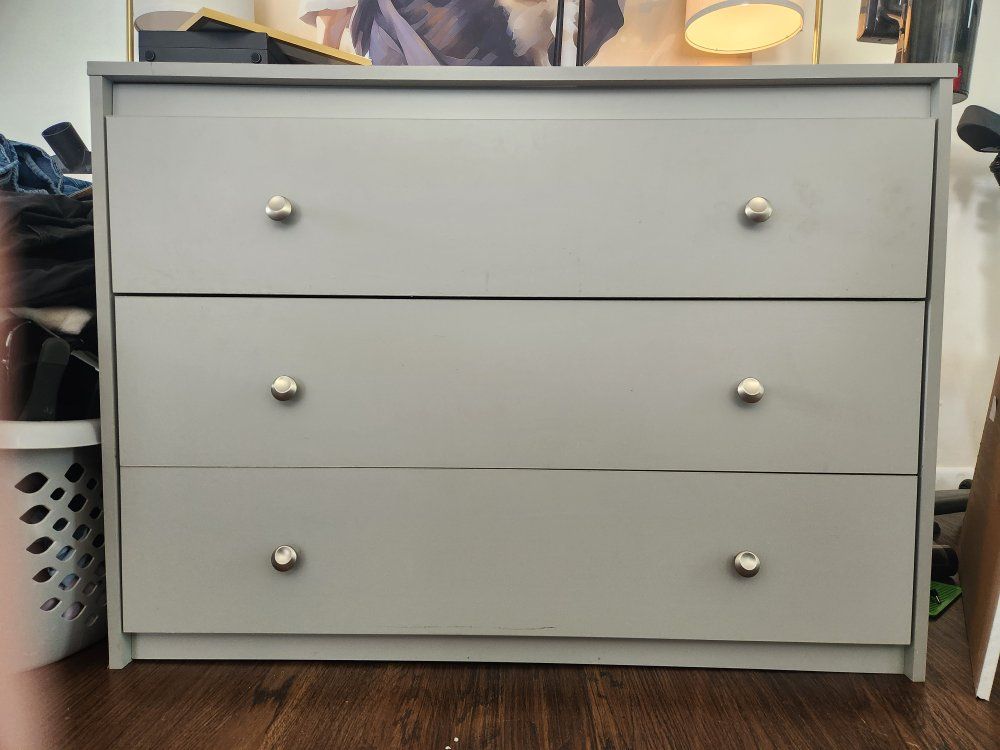 Gray 3-Drawer Wood Dresser with Silver Knobs - Fair Condition