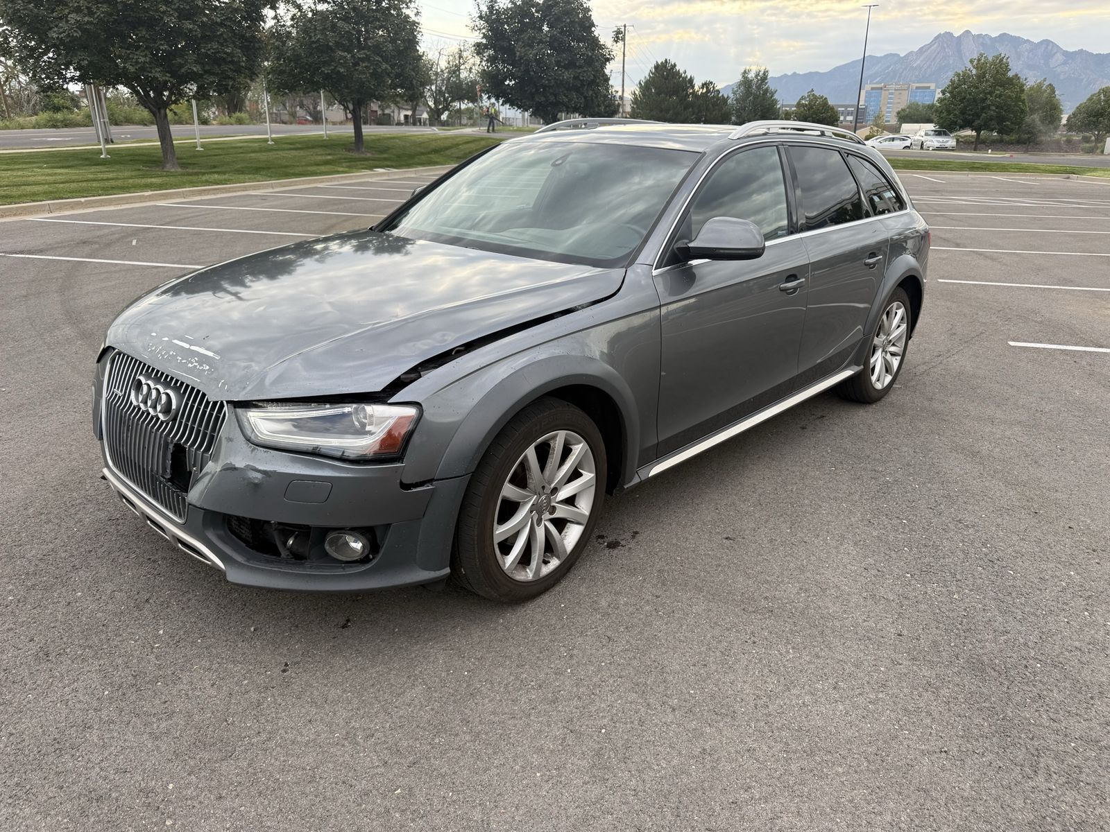 2016 Audi Allroad 2.0T quattro Premium Plus — rebuilt & branded title, 73% below market