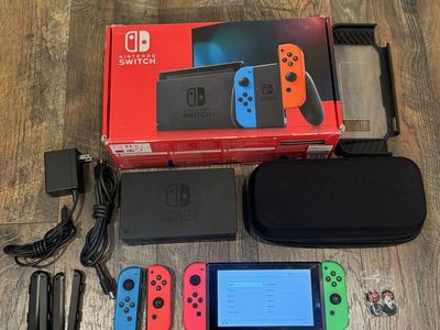 Nintendo Switch Bundle x4 Joy Cons Nintendo 128GB SD Card