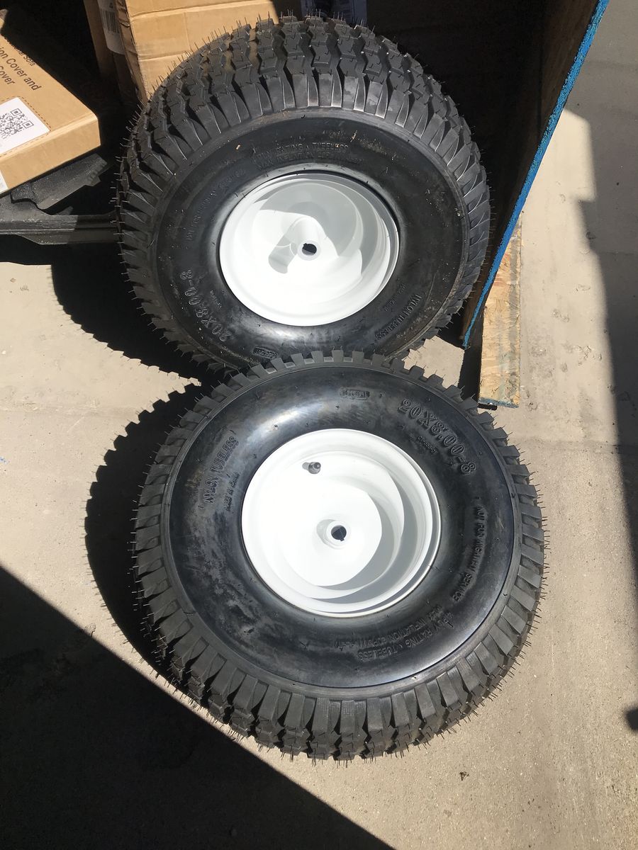 Two brand new riding lawn Mower tires and rims 20 x 8 x 8 tires