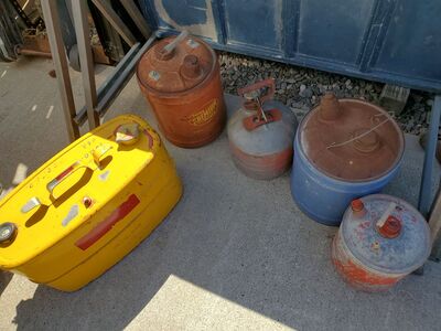 Vintage oil and fuel cans