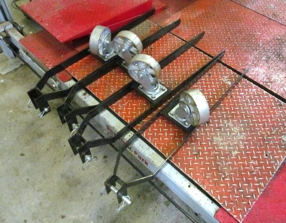 Auto lift dollies. 4 post lift