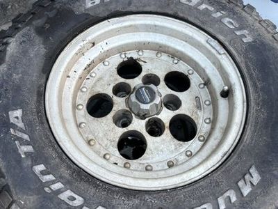 Wheels and tires off 1989 Jeep Cherokee