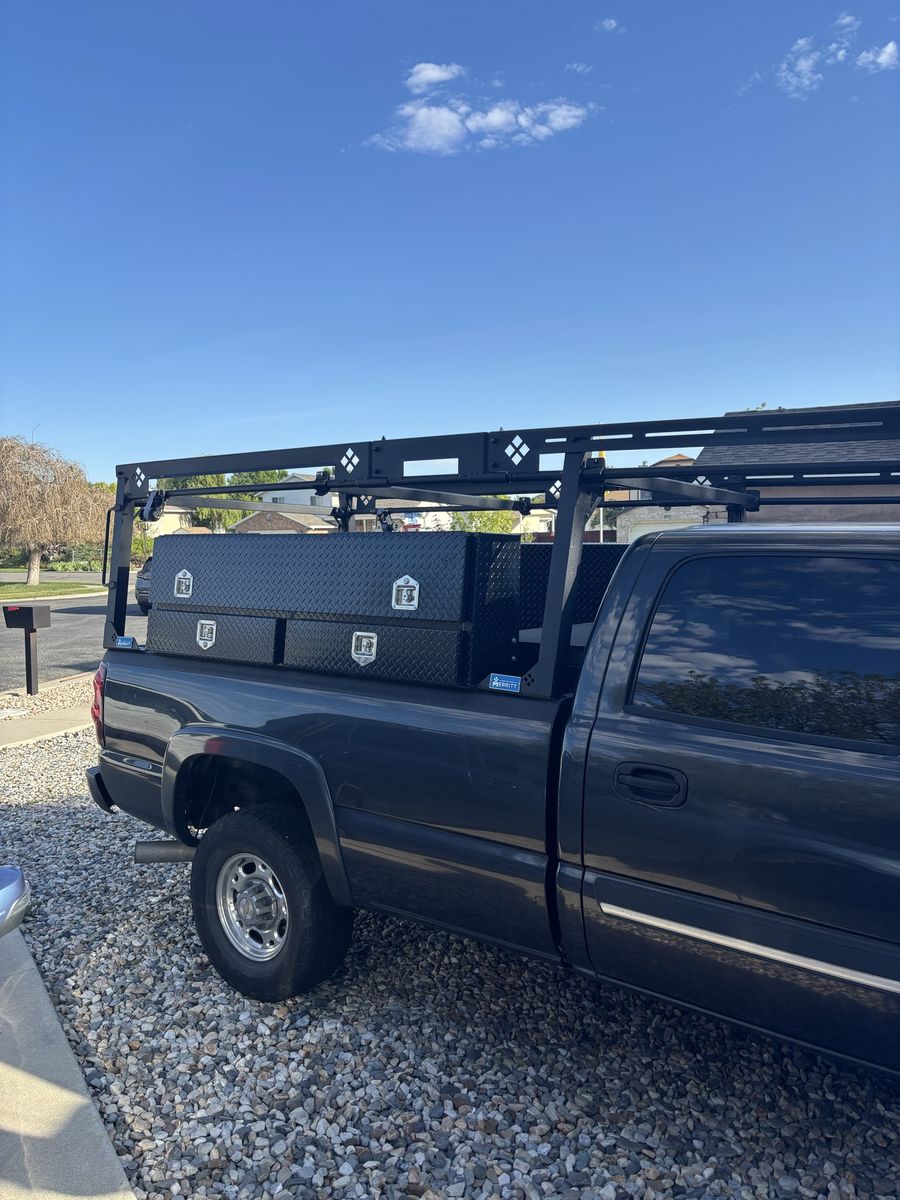 Truck pipe rack and work boxes