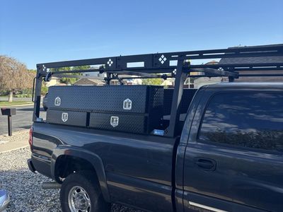 Truck pipe rack and work boxes