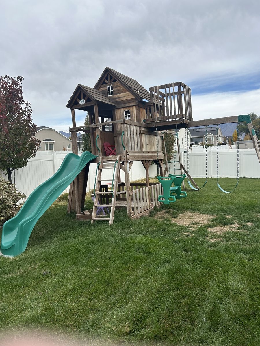 Large Wooden Swing Set Playhouse with Slide, Swings, and Rock Wall - Backyard Playset