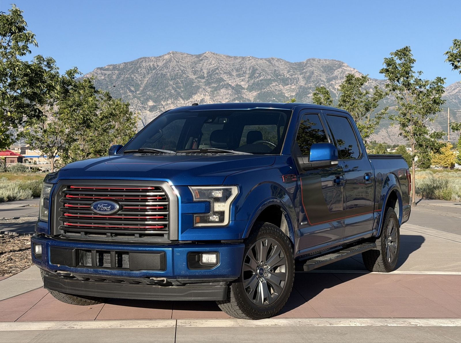 2017 Ford F-150 Lariat — rebuilt & branded title, 5% below market