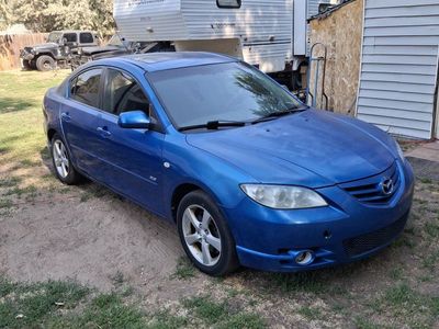 Blue Mazda 3 Sedan 2.3L 4-Cylinder DOHC 16-Valve