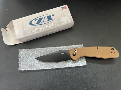 Zero Tolerance (ZT) 0512 Auto. Factory blade, never carried, never cut.
