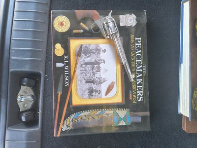 The Peacemakers: Arms and Adventure in the American West by R.L. Wilson Hardcover Book