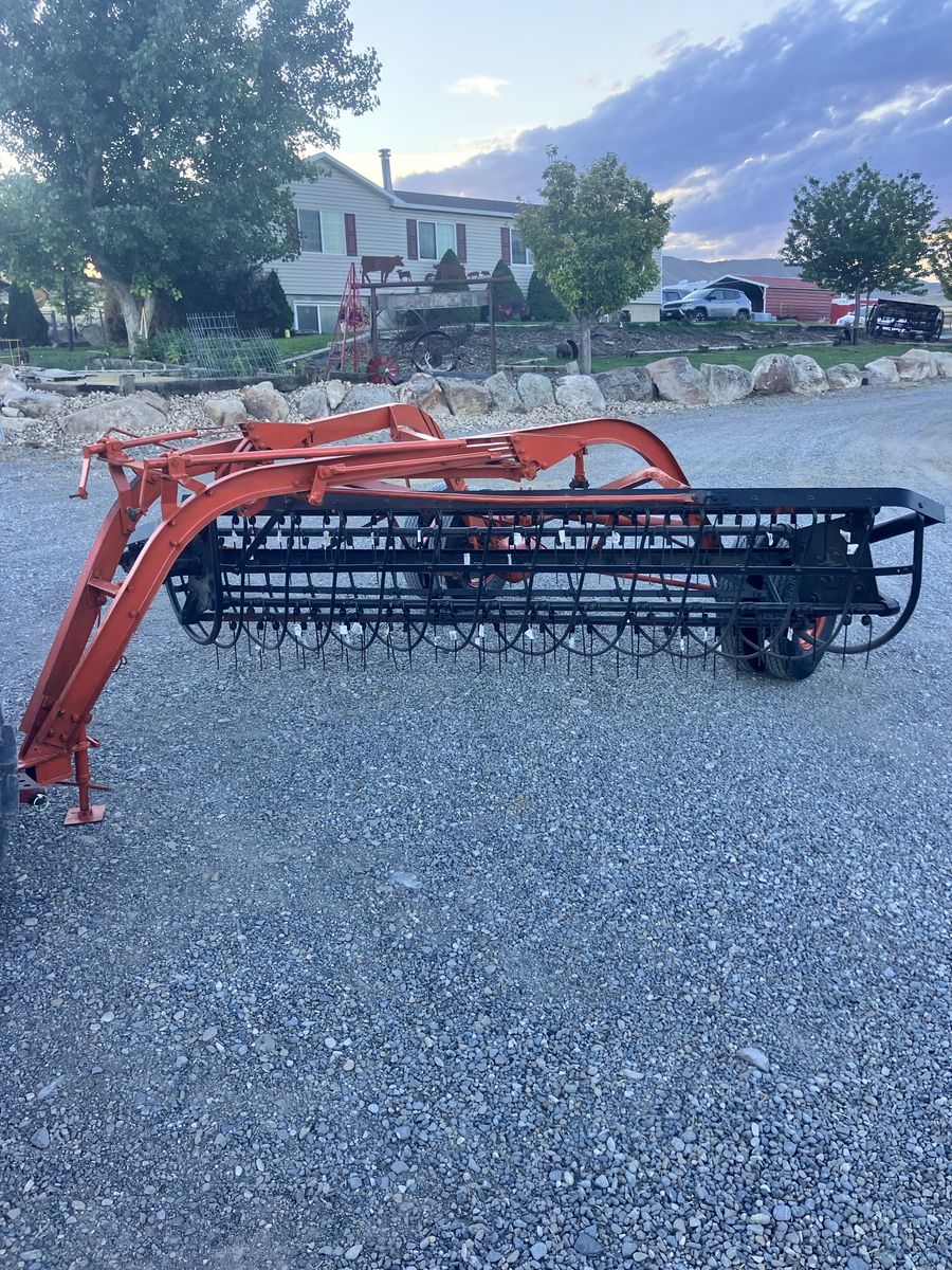 Case side delivery rake