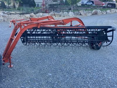 Case side delivery rake