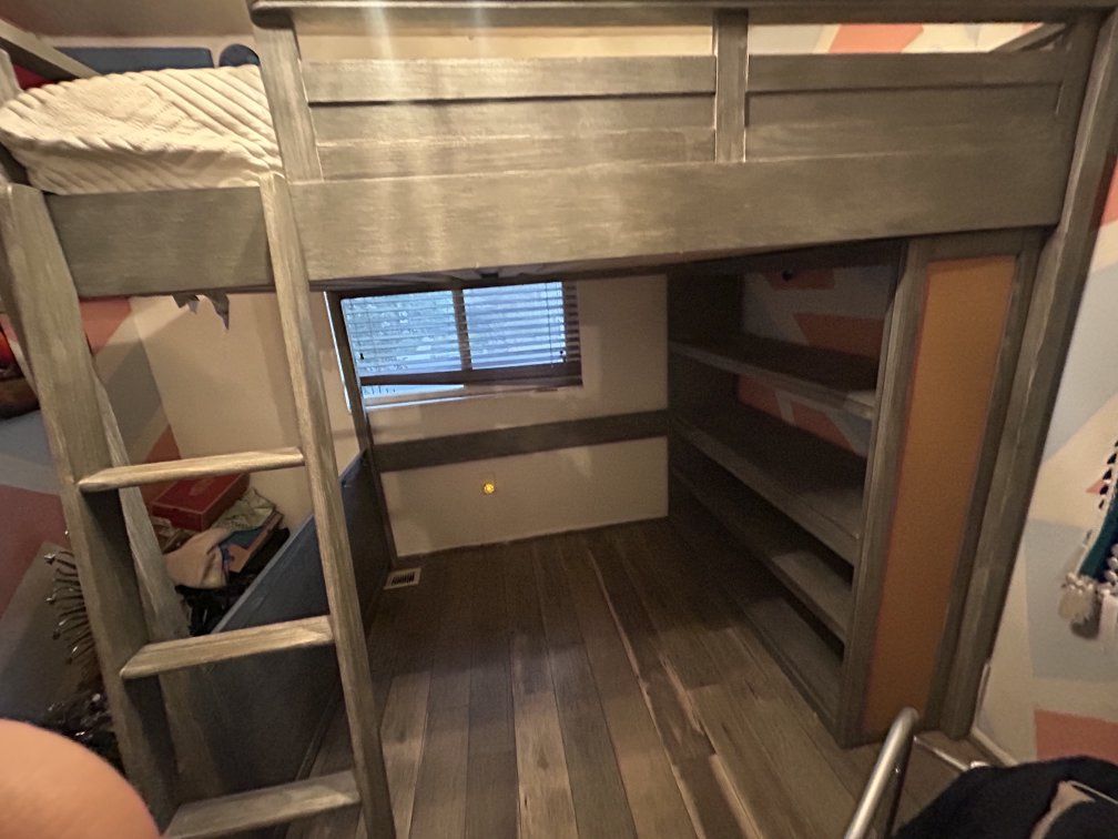 Gray Loft Bed with Ladder and Built-in Shelves - Space-Saving Design
