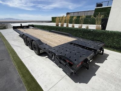 Super Champion APAK Trailers Flatbed Utility Trailer with ramps. Triple axle 21,000 GVR