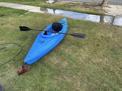Blue Kayak with Paddle - Ready for Water Adventures