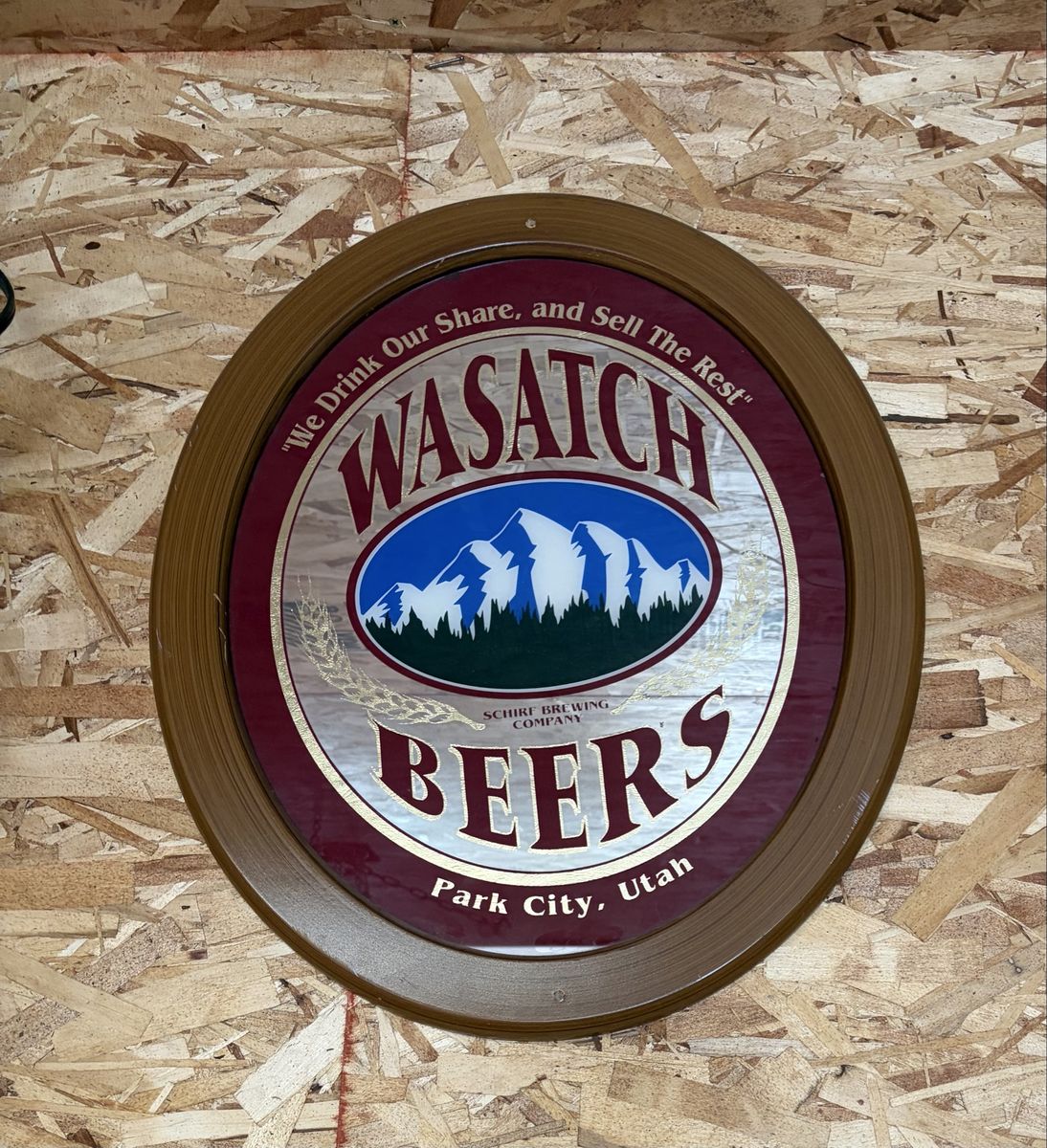 Vintage round wooden framed mirror wasatch beers sign