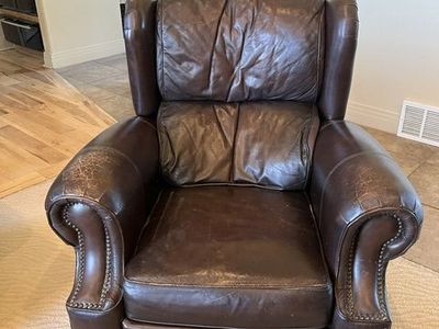 Luxurious Brown Leather Recliner Armchair - Nailhead Trim, Plush Comfort, Well-Maintained