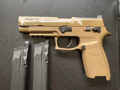 Upgraded Airsoft SIG M17 with 2 mags
