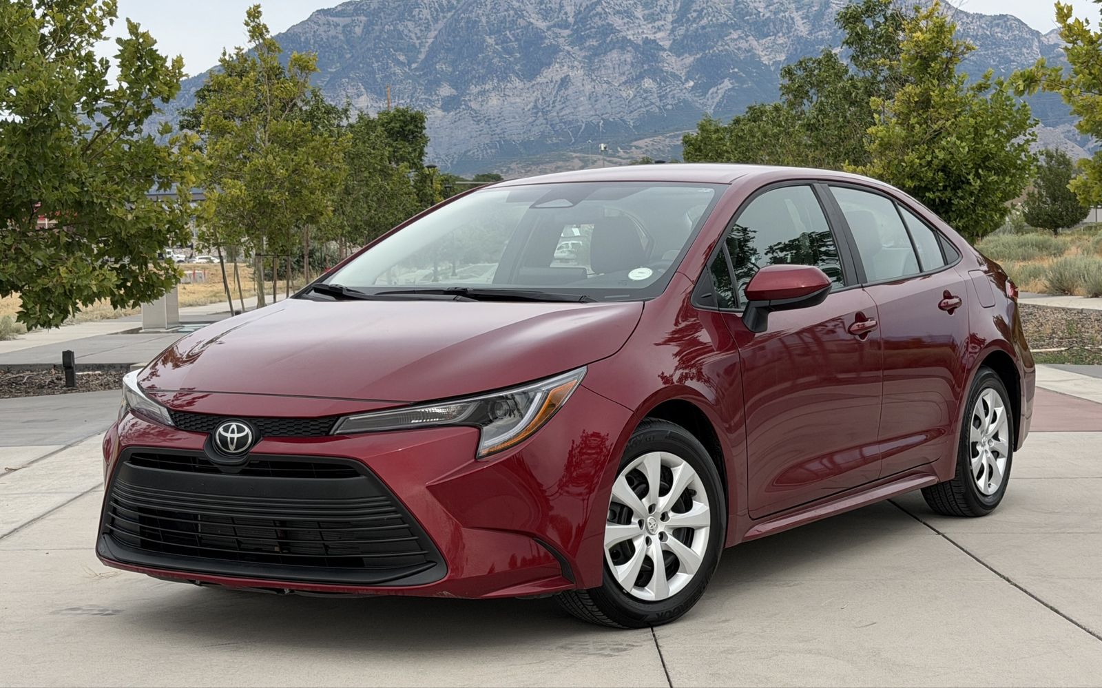 2025 Toyota Corolla LE — rebuilt & branded title, 26% below market