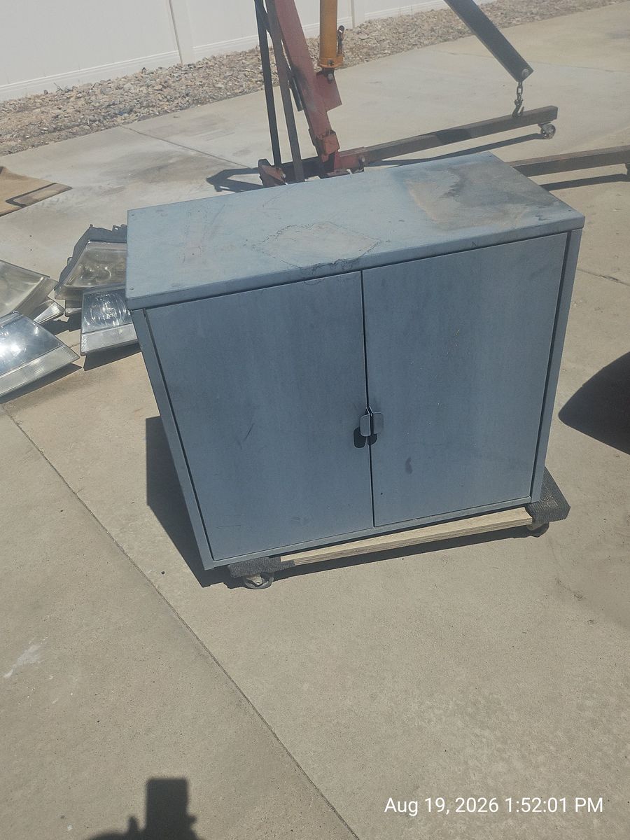 Used Blue Steel Rolling Storage Cabinet with Double Doors and Shelves