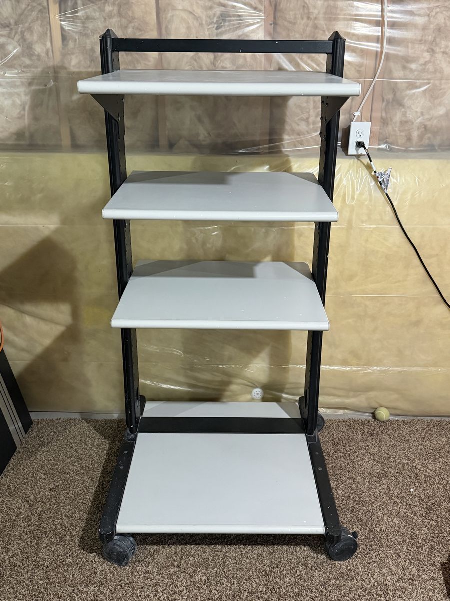Multi-Purpose 4-Tier Rolling Utility Cart with  Wheels and Adjustable Shelf Heights.