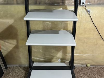 Multi-Purpose 4-Tier Rolling Utility Cart with Wheels and Adjustable Shelf Heights.