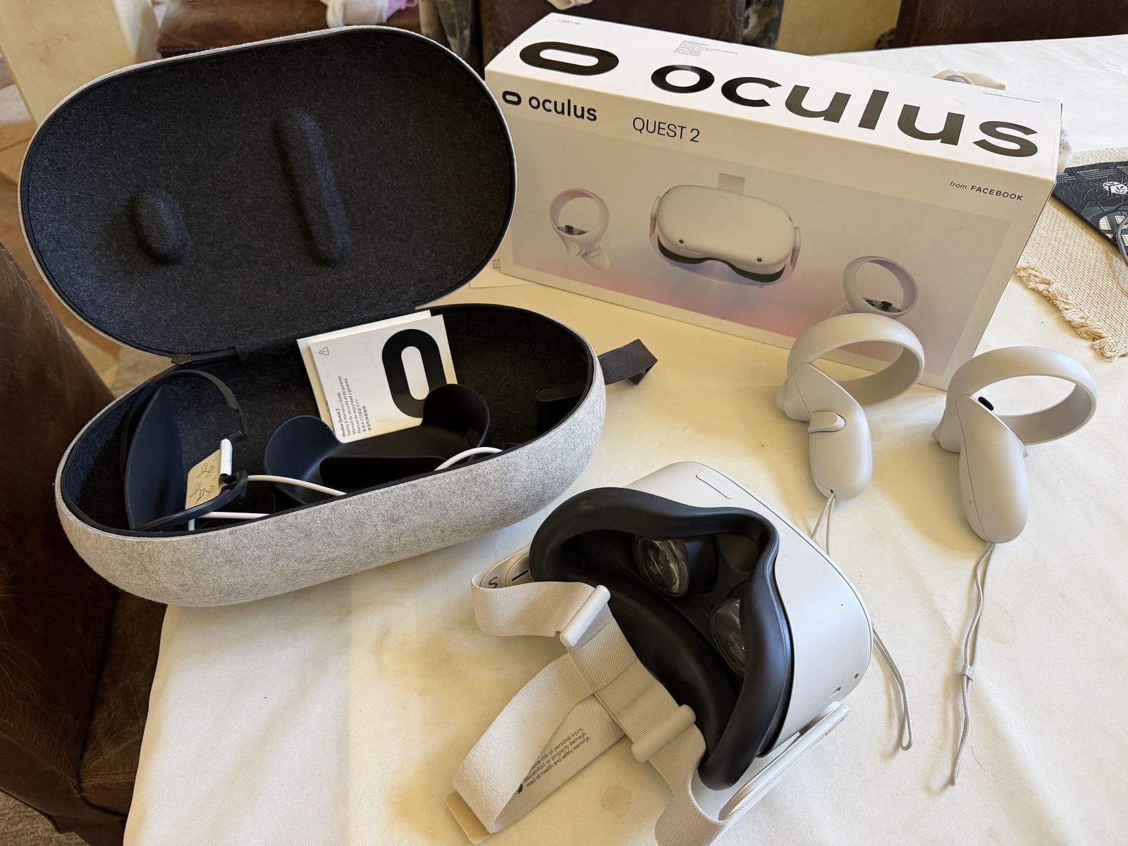 Oculus Quest 2 VR Headset with carrying case and controllers