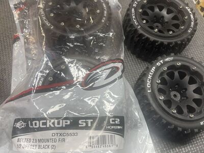 Brand New Duratrax Lockups Belted Wheels $50
