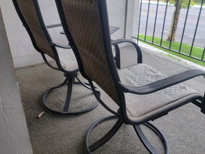 Patio Set - 2 Swivel Rocker Chairs and Tile Top Table - Damaged Fabric