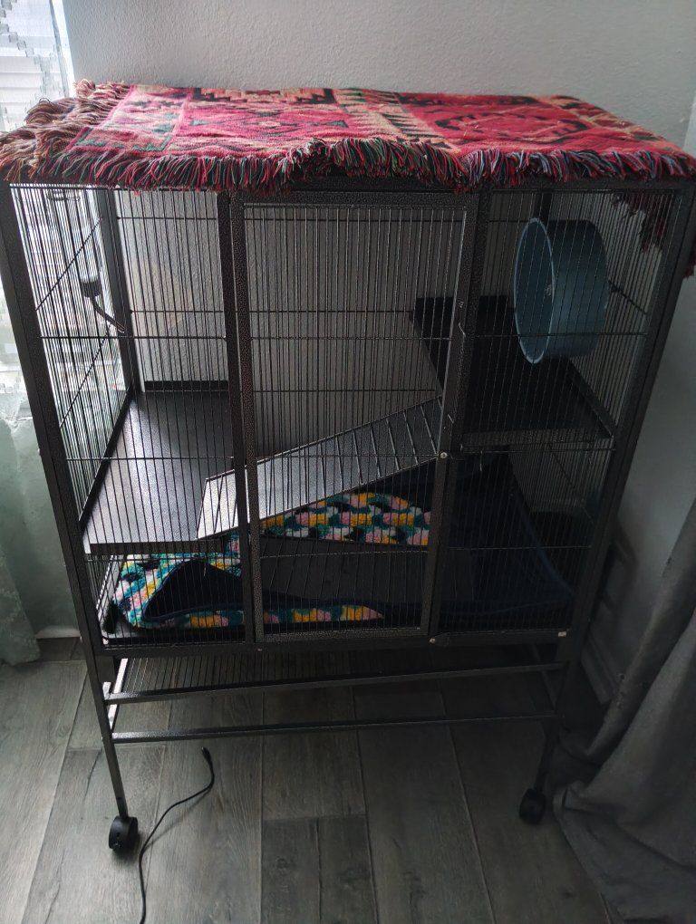 Large Multi-Tier Metal Pet Cage with Shelves, Ramps, and Wheel on Casters