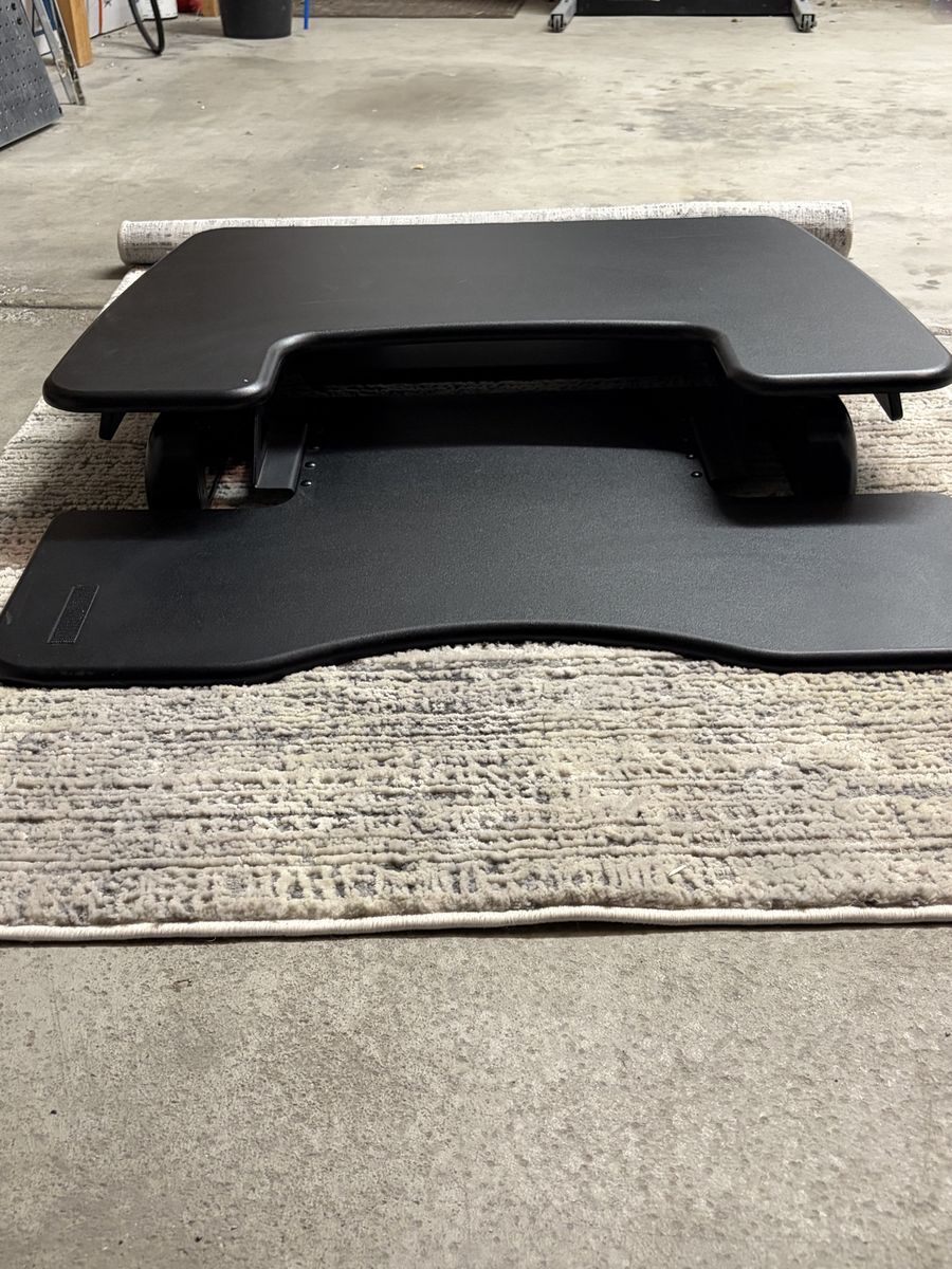 Vari-desk Black Adjustable Standing Desk Converter. Sit-Stand Riser Workspace Solution (Manual raise/lower mechanism)