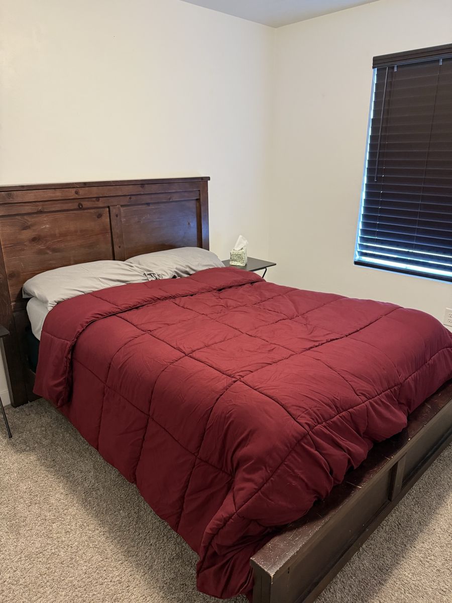 Dark wood bed with box and mattress
