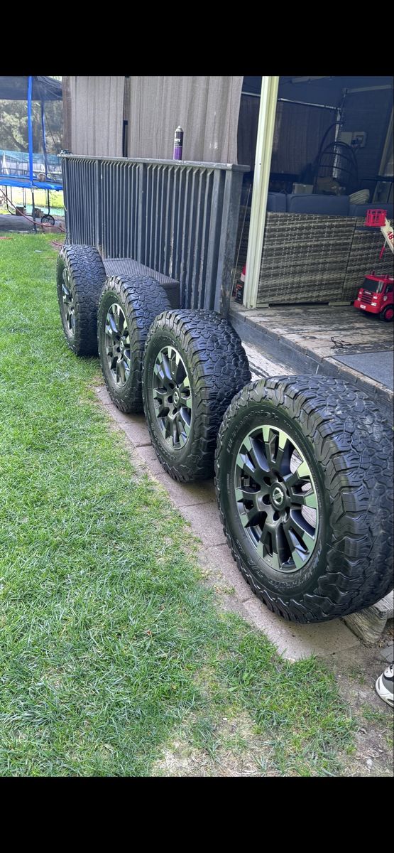 Set of 4 Nissan Factory Wheels with BFGoodrich All-Terrain T/A KO2 Tires 275/70/18