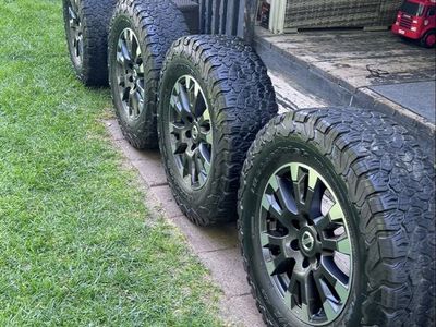 Set of 4 Nissan Factory Wheels with BFGoodrich All-Terrain T/A KO2 Tires 275/70/18