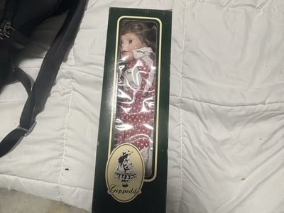 Geppeddo Porcelain Doll
