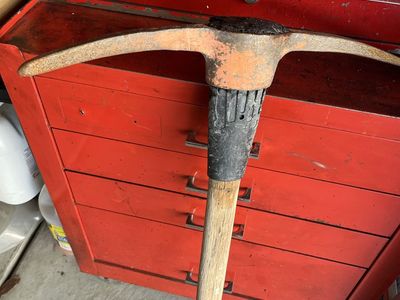Used Pickaxe with 36”Wooden Handle and Heavy-Duty Metal Head