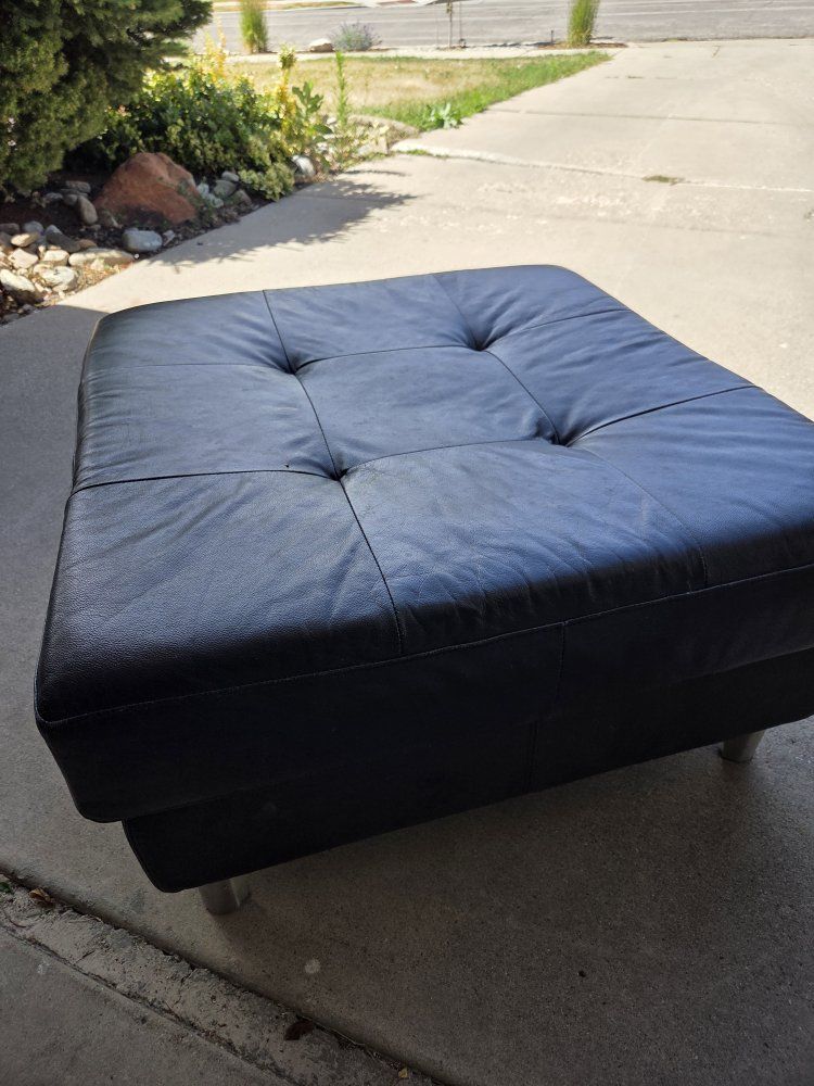 Black Leather Tufted Ottoman with Chrome Legs - Fair Condition