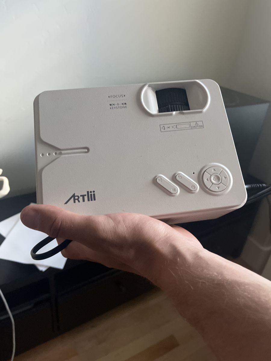 ARTlii Mini Projector - Compact Portable Home Theater Projector with Focus & Keystone