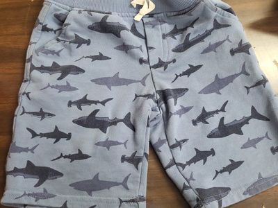 Boys shorts size 6 blue with navy blue sharks.