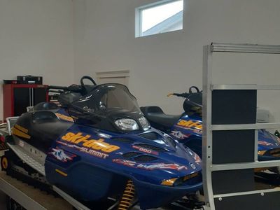 Three Ski-Doo Summit 800 Snowmobiles